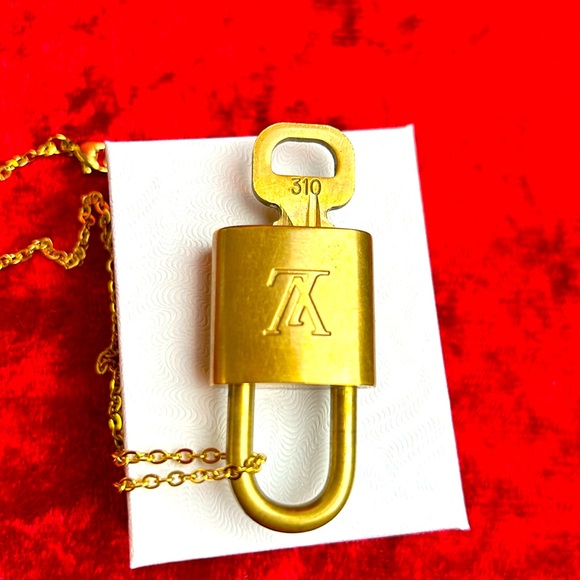 Louis Vuitton Jewelry - Louis Vuitton lock and key. Key number 310. ID # 13 final price